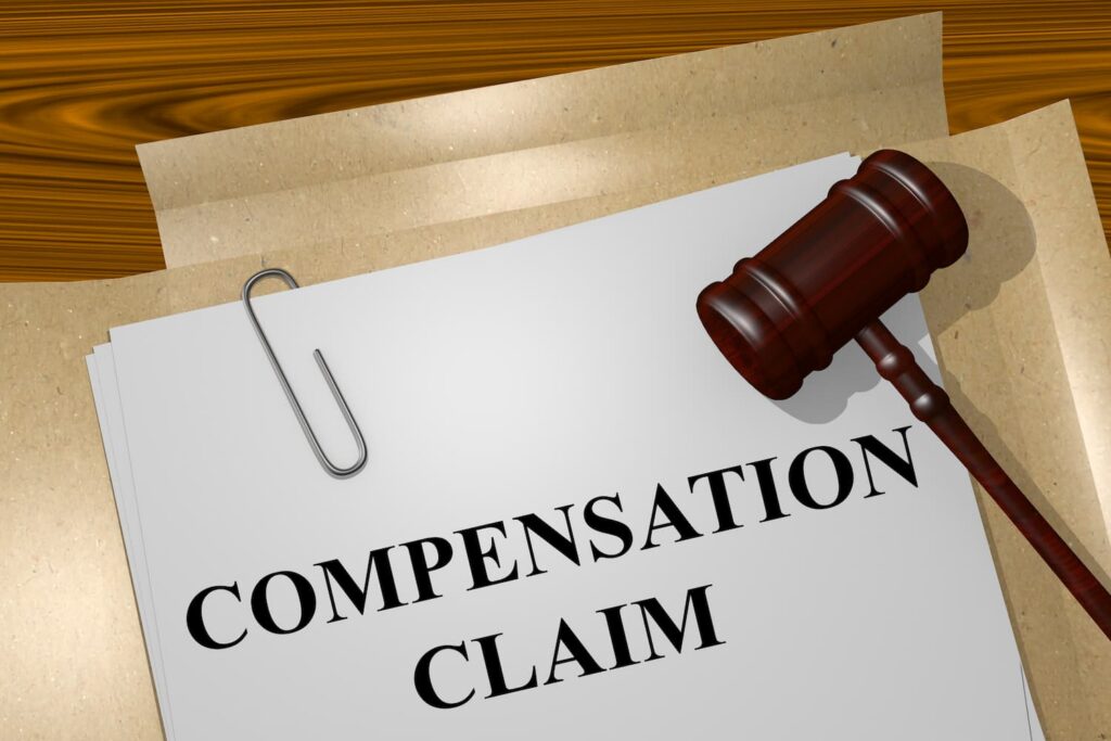 Truck accident compensation claim document with gavel representing financial recovery after a New York City truck accident